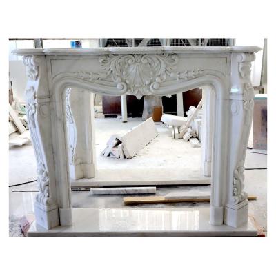 China Modern warm natural marble surround handmade carved fireplace mantel for sale