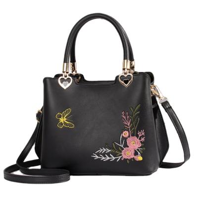 China Fashion top selling handbags 2021 new ladies solid printed handbags shape thin shoulder strap simple handbags for sale