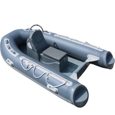 China Fiberglass 4 Person 2.7M Rib Hypalon Boat Rigid Inflatable Boat With Aluminum Floor For Sale for sale