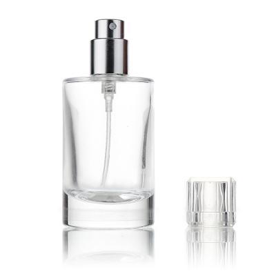 China Wholesale Thick Wall Perfume Bottle 20ml Round Perfume Bottle With Pump Spray for sale