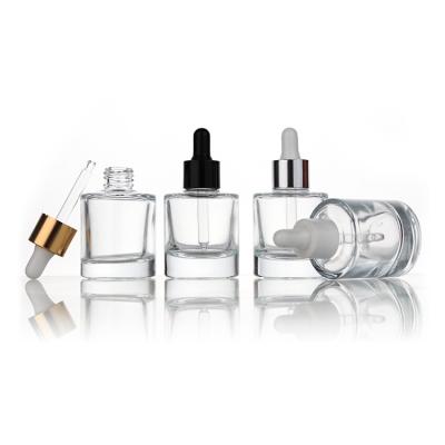 China Skin Care Oil Clear Thick Bottom Round Shape Customizable Colors 30ml Essential Oil Glass Serum Dropper Bottle for sale