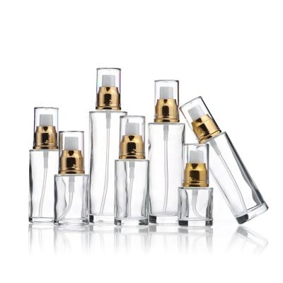 China Wholesale Cosmetic OEM Brands Skin Care Cosmetics Packaging Serum Lotion Pump Glass Bottle for sale