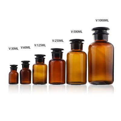 China Wholesale 250ml 500ml Brown Amber Glass Apothecary Bottle Pharmacy Medicine Liquid Reagent Bottle With Glass Stopper for sale