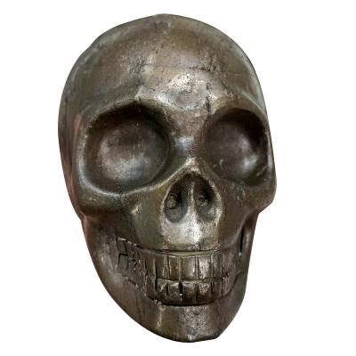 China Europe Realistic Crystal Skulls Hand Cut Iron Skulls For Healing for sale