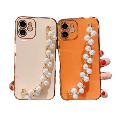 China Luxury Anti-fall Plating Pearl Bracelet Chain Phone Case for iphone 12 11 pro 7 8 max plus soft shockproof cover for sale