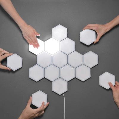 China Amazon DIY Modular Hexagonal Wall Lamp DecorationLED Quantum Honeycomb Light Touch Modern Night Lamp for sale