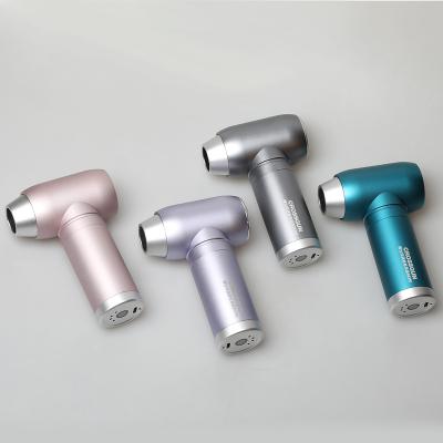 China Mini Muscle Massage Gun With Hair Dryer Pistola De Masaje Cordless Rechargeable Super Deep Tissue Pain Relief Massager for sale