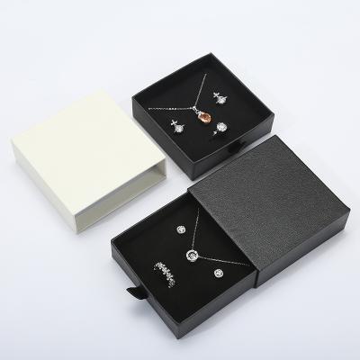 China Black And White Jewelry Drawer Mezzanine Packing Boxes With Logo Small Leather Jewelry Box Luxury Jewelry Box for sale