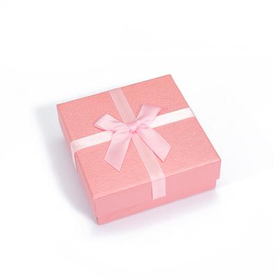 China Jewelry Packaging Custom Jewelry Boxes With Logo Cross Ribbon Bow Jewelry Boxes Packaging Luxury Jewelry Box Packaging for sale