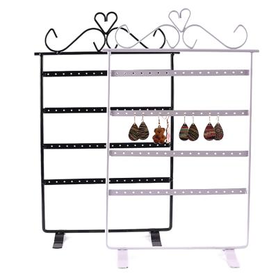 China Jewelry Display Jewelry Stands Customized Wholesale Metal Heart Shape Four Floors Piercing Jewelry Display Earring Display Stands for sale