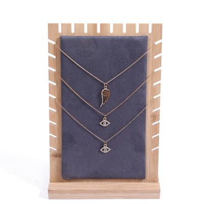 China Fashion Slot Jewelry Display Stand Creative Detachable Three Side Pendant Display Board for sale