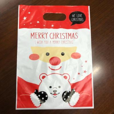 China Security Custom Design Printed OEM Christmas Gift Package Punch Handle Die Cut Bag PO Shopping Plastic Carrier for sale