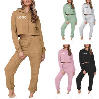 China Anti-wrinkle women clothes crop tops solid color women's fall two-piece tracksuit teams 2 pieces set joggers Sweatsuit for sale