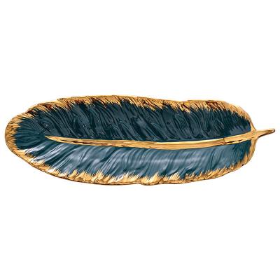 China Sustainable European Style Gold Nordic Creative Dessert Dishes Feather Ceramic Tray for sale