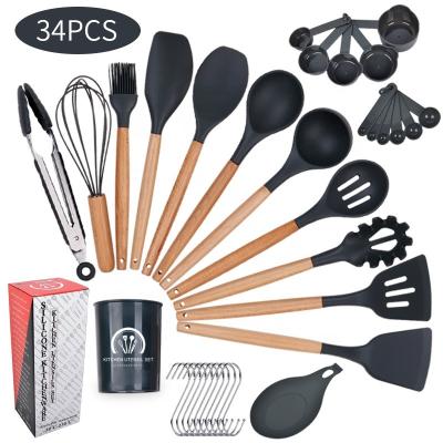 China Colorful Wooden Kitchen Utensils 11 Sets Silicone Handle Spoon Non-Stick Easily Cleaned Shovel Set Cooking Utensils 12 Sets for sale