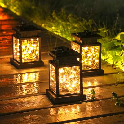 China Outdoor Solar Lawn Landscape Light Flashing Waterproof Hanging Solar Lamp Copper Wire LED Candle Glow Solar Lights Xmas Decoration Solar Lamp for sale