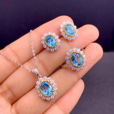 China Trendy Charm Fashion 925 Silver Plated Zircon Adjustable Sea Sunflower Blue Stone Ring With Slit Earrings Pendant Necklace Set for sale