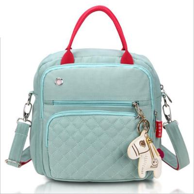 China 2020 new fashion backpack fashion mother and child bag multi-back fabric waterproof bag one-shoulder small diagonal cross mom bag for sale