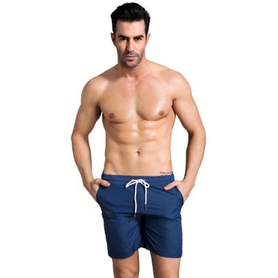 China Cheap Simple Sports Wear Colors Taslan Quick Dry Solid Anti-Wrinkle Men's Swim Boxing Beach Shorts With Drawstring for sale