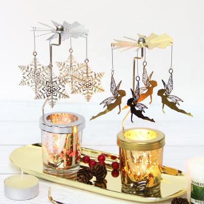 China Nordic Home Appliance Hot Air Rotating Metal Candle Holder With Candlelight Glass Dinner Party Decoration for sale