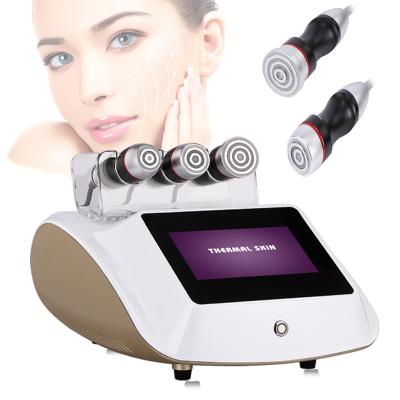 China Wrinkle Remover 2021 3 in 1 Eddy Current Radio Frequency Facial Skin Lifting and Slimming Machine for sale