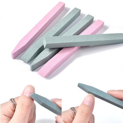 China Trimming dead skin and callus around professional nail manicure salon use Emery Material Nail Sanding Cuticle Pusher Stone Cuticle Pusher for sale