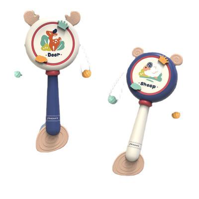 China Baby Rattle Soft Chew Gum and Ring Bell Easy Grasp Safety Soft Silicone Baby Rattle Drum Rubber Toy for sale