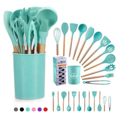 China Sustainable BPA Free Gray 12 Pcs Silicone Cookware Heat Resistant Kitchen Utensil Set With Wooden Handles for sale