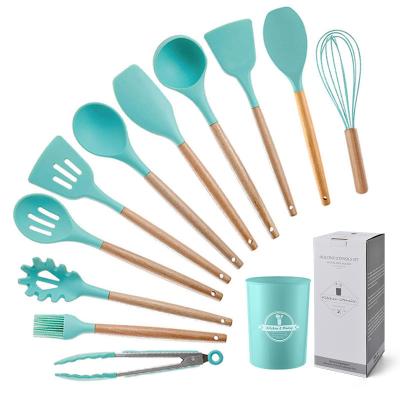 China Sustainable Reusable Cookware Supplies 12pcs Nonstick Accessories Cooking Tools Silicone Kitchen Utensil Set With Wooden Handle for sale