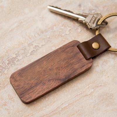 China Sale Wooden Key Chain Metal Ring Leather Keychains White Wood Available for sale