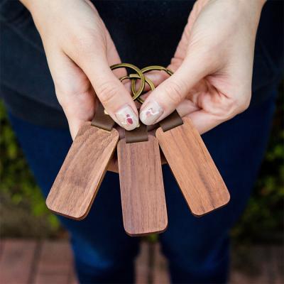 China Mini Fashion Rectangle Sublimation Blank Wooden Key Chain Metallic Leather Keychains From China Manufacturer for sale