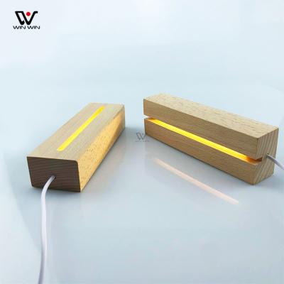 China Amazon Wholesale Eco-Friendly Oval LED Night Light Wooden Base Acrylic Night Light for sale