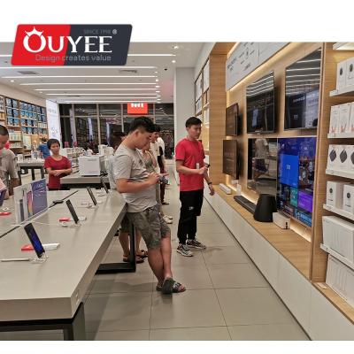 China Displaying Goods Mobile Phone Shop Interior Decoration Latest Designed Wooden Customized Display Wall Cabinet for sale