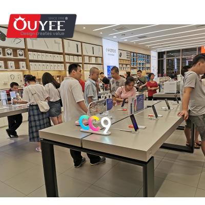 China Displaying Goods Merchandise Modern Mobile Retail Store Customize Designed Wooden Phone Accessories Display Table for sale