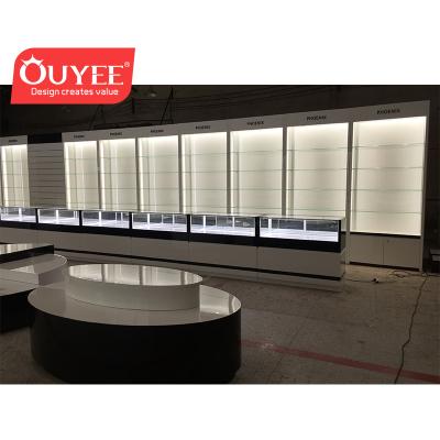 China MDF/Polywood/Wood+Ultra Clear Modern Style Clear Tempered Glass Lockable Cell Phone Display Cabinet With LED Light Strip for sale