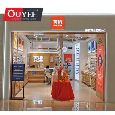 China Latest Optical Store Optical Store Interior Decoration Designs With Glass Display Cabinet Wholesale Showcase for sale