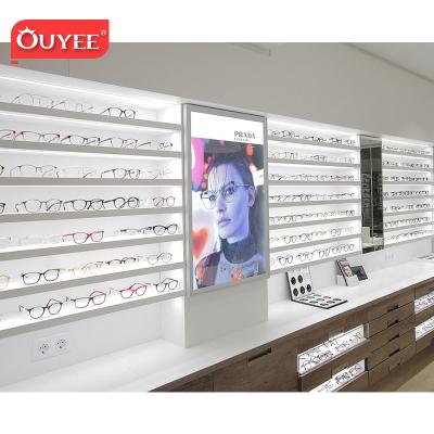 China Optical Store Customized Wall Mount Monocle Display Sunglasses Show Rack Eyewear Optical Store Decoration Shop Interior Design for sale