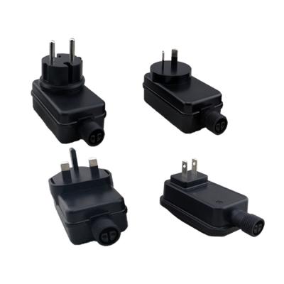 China Electronic Products Power Waterproof IP44 IPX4 5v 1.2a Changeover Eu Us UK Plug Adapter for sale