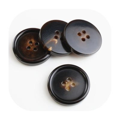 China Customized bulk nickel free round four hole true horn button for coat, shirt suits, knitwear, wool coats for sale