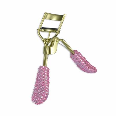 China Eco-friendly Gold Eyelash Curler Massage Spring Handle Stainless Steel Lash Curler for sale