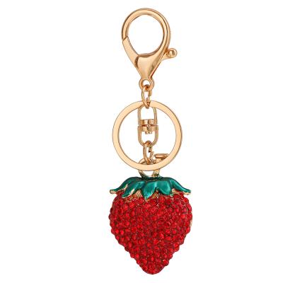 China Full Diamond Strawberry Handbag Pendant Metal Alloy Rhinestone Jewelry Crystal+Metal Steric Fruit Key Chains For Women Purse Charms for sale