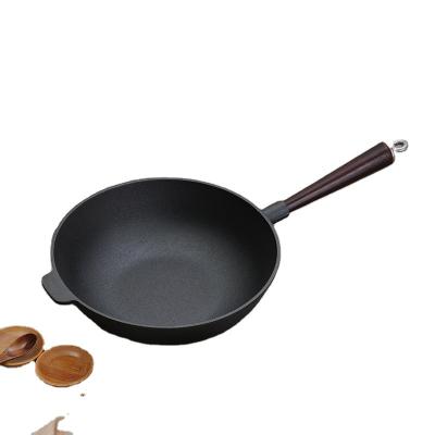 China Stocked Chinese Cast Iron Wok Wok With Wooden Handle for sale