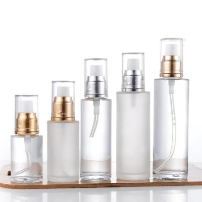 China 50ml 100ml glass cosmetic frosted glass bottle for cosmetics packaging spray glass bottle for sale