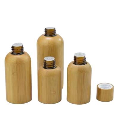 China Personal Care Low MOQ Ready To Ship 10ml 15ml 30ml 50ml Bamboo Essential Oil Bottle With Lid Or Dropper for sale