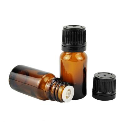 China Personal Care 5ml 10ml 15ml 20ml 30ml 50ml 100ml Essential Oil Amber Glass Bottle With Plastic Lid for sale