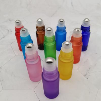 China Personal Care Empty Clear Amber Blue Glass Perfume Roll On Bottle Essential Oil Perfume Oil Roller Bottles for sale