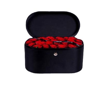 China Handmade Round Black Rose Packing Box Lid Suitcase Direct Selling Gift Box Oval Flower Box for sale