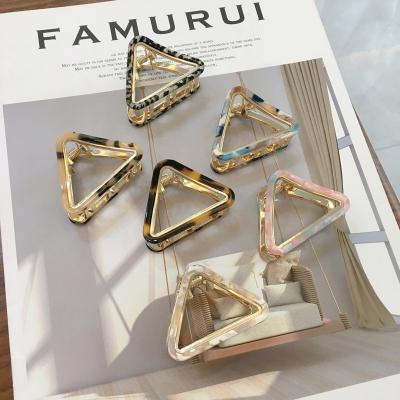 China Newest New Korean Yucat Women Shape Hollow Acrylic Hair Accessories Hair Clips Triangle Hair Claw For Girls for sale