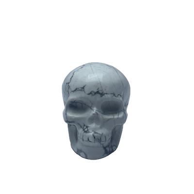 China China wholesale natural crystal howlite hand carved skulls for fengshui decoration for sale