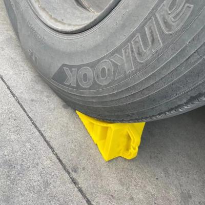 China Truck tire rubber yellow plastic plug, wheel chock, wheel block for sale